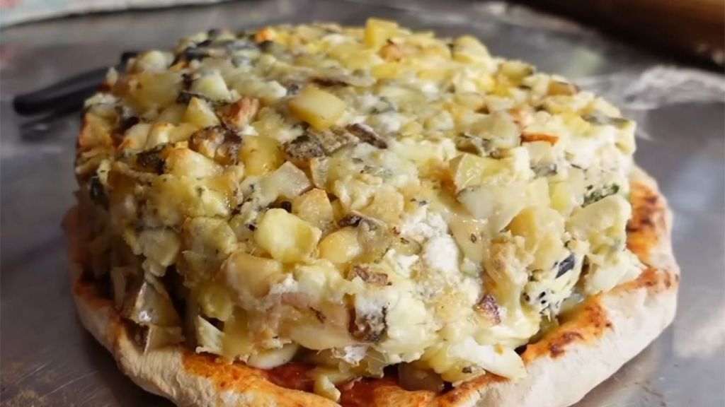 Chefs franceses bateram o recorde ao produzirem uma pizza com mais de mil tipos de queijo