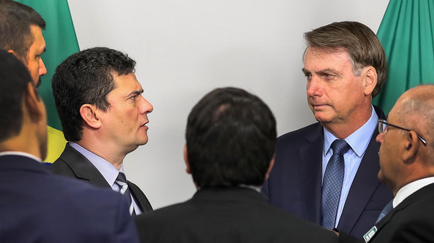 O presidente Jair Bolsonaro e Sergio Moro em reunião do Ministério da Justiça