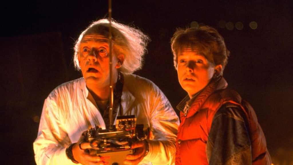 Doc Brown (C. Lloyd) e Marty McFly (Michael J. Fox) em De Volta para o Futuro