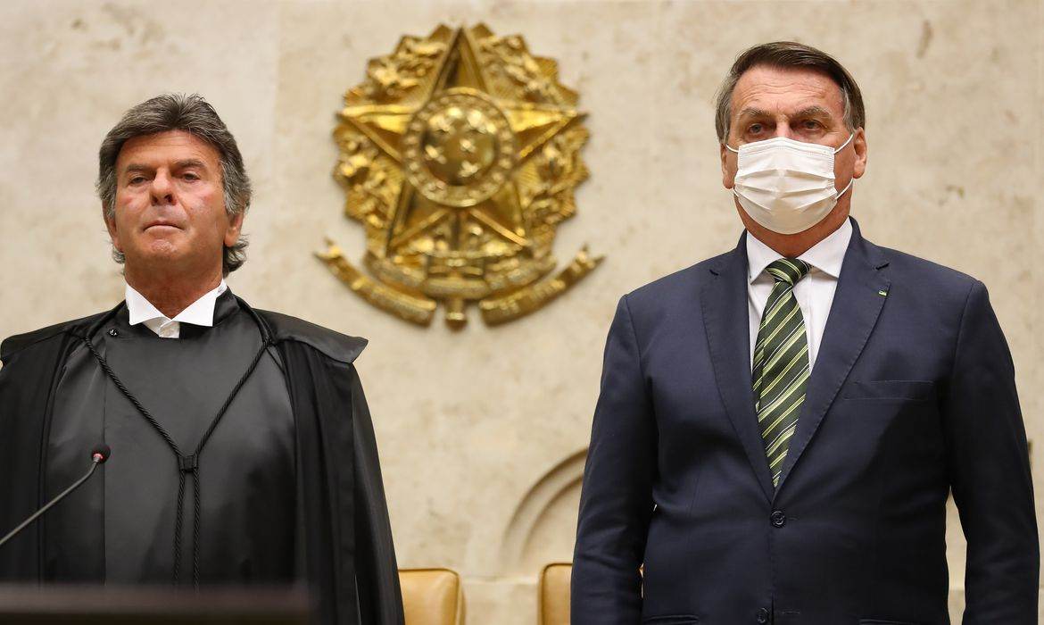 Ministro Luiz Fux ao lado do presidente Jair Bolsonaro