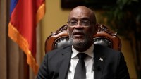 Primeiro-ministro do Haiti assina renúncia e conselho de transição toma posse