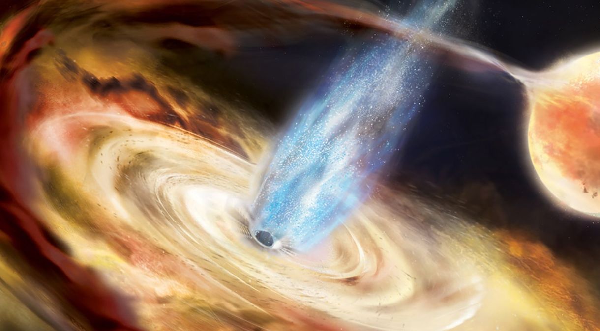 Um buraco negro puxa material de uma estrela vizinha para um disco de acreção nesta ilustração