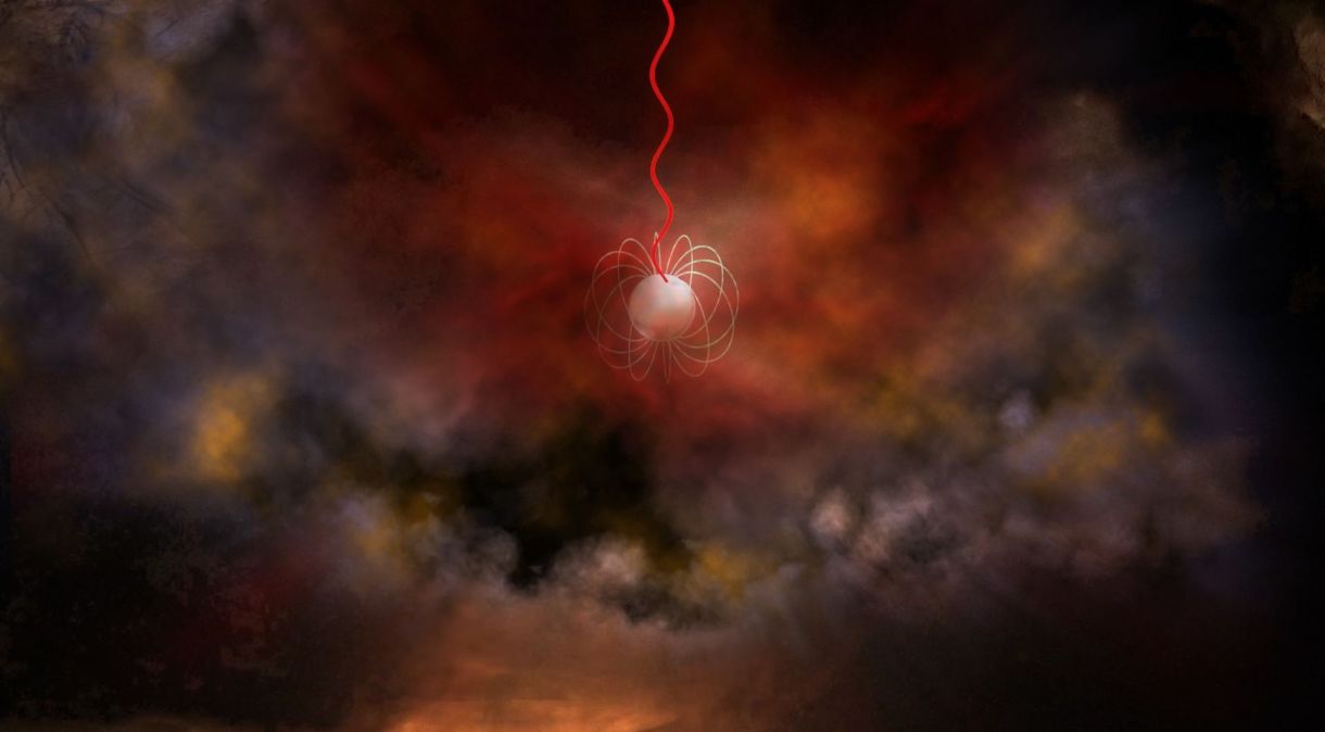 Conceito artístico de uma estrela de nêutrons com um campo magnético ultraforte, chamado magnetar, emitindo ondas de rádio (em vermelho)