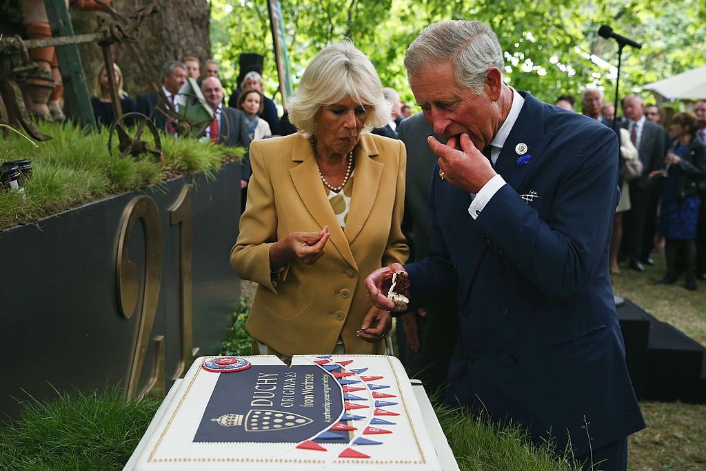 O então príncipe Charles e sua esposa, Duquesa da Cornualha, comemoram 21º aniversário da marca Duchy Originals, em setembro de 2013