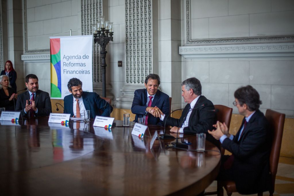 Fernando Haddad e Marcos Pinto em lançamento de reformas microeconômicas