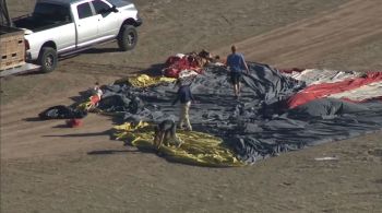 Paraquedistas conseguiram saltar do balão antes do acidente