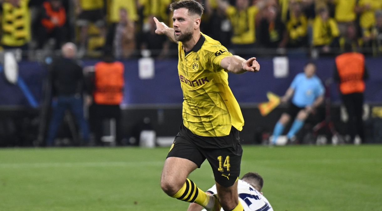 Füllkrug comemora o gol da vitória do Borussia Dortmund sobre o PSG