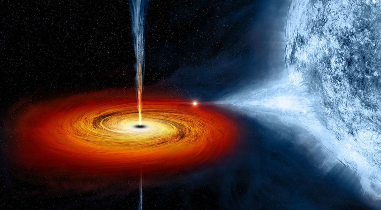 Em uma ilustração artística, um buraco negro puxa material de uma estrela companheira, formando um disco que gira ao redor da estrutura antes de cair nela